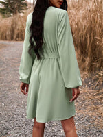 A-lijn Jurk met V-hals en Ceintuur - Group6 - Jurkjes.co