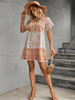 Boho Jurk met V-hals en Bloemenprint - Mini Dresses - Jurkjes.co
