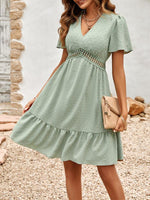 Knie-lange Jurk met V-hals en Kantdetail - Group4 - Jurkjes.co