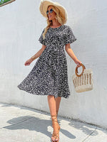 Knie-lange Jurk met V-hals en Leopardprint - Group6 - Jurkjes.co