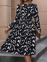 Lange Jurk met Sleutelgat-hals en Abstracte Print - Midi Dresses - Jurkjes.co
