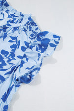 Maxi Jurk met Bloemenprint en Flutter Mouwen - Floral Dresses - Jurkjes.co