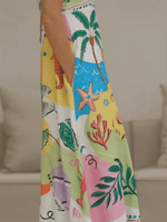 Maxi Jurk met Spaghetti Bandjes en Tropische Print - Group10 - Jurkjes.co