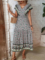 Maxi Jurk met V-hals en Bloemenprint - Group12 - Jurkjes.co