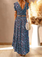 Maxi Jurk met V-hals en Bloemenprint - Maxi Dresses - Jurkjes.co