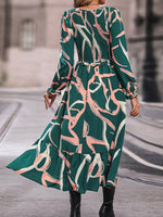 Maxi Jurk met V-hals en Geometrisch Design - Group12 - Jurkjes.co