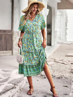 Midi Jurk met Bloemenprint en Hoge-Lage Zoom - Midi Dresses - Jurkjes.co