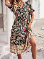 Midi Jurk met Bloemenprint en Hoge-Lage Zoom - Midi Dresses - Jurkjes.co