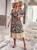 Midi Jurk met Bloemenprint en Hoge-Lage Zoom - Midi Dresses - Jurkjes.co