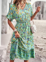 Midi Jurk met Bloemenprint en Hoge-Lage Zoom - Midi Dresses - Jurkjes.co