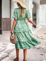 Midi Jurk met Bloemenprint en Hoge-Lage Zoom - Midi Dresses - Jurkjes.co
