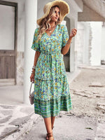 Midi Jurk met Bloemenprint en Hoge-Lage Zoom - Midi Dresses - Jurkjes.co