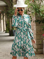 Midi Jurk met Bloemenprint en Plooirok - Group3 - Jurkjes.co