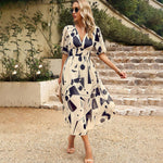 Midi Jurk met Bloemenprint en V-hals - Dresses - Jurkjes.co