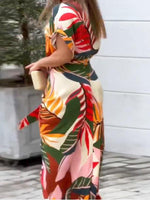 Midi Jurk met Tropische Print en Strikceintuur - Group7 - Jurkjes.co