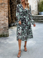 Midi Jurk met V-hals en Abstracte Print - Midi Dresses - Jurkjes.co