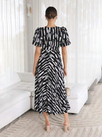 Midi Jurk met V-hals en Abstracte Print - Midi Dresses - Jurkjes.co