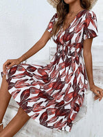 Midi Jurk met V-hals en Bladerenprint - Midi Dresses - Jurkjes.co