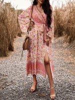 Midi Jurk met V-hals en Bloemenprint - Group11 - Jurkjes.co