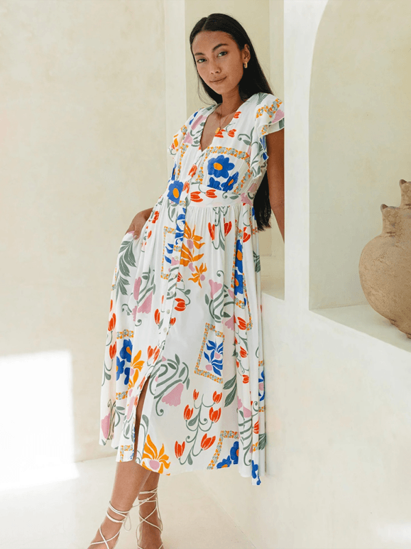 Midi Jurk met V-hals en Bloemenprint - Group11 - Jurkjes.co