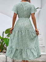 Midi Jurk met V-hals en Bloemenprint - Group12 - Jurkjes.co