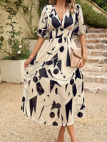 Midi Jurk met V-hals en Bloemenprint - Maxi Dresses - Jurkjes.co