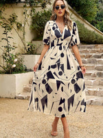 Midi Jurk met V-hals en Bloemenprint - Maxi Dresses - Jurkjes.co