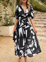 Midi Jurk met V-hals en Bloemenprint - Maxi Dresses - Jurkjes.co