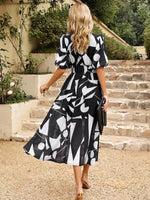Midi Jurk met V-hals en Bloemenprint - Maxi Dresses - Jurkjes.co