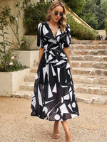 Midi Jurk met V-hals en Bloemenprint - Maxi Dresses - Jurkjes.co