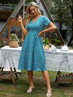 Midi Jurk met V-hals en Bloemenprint - Midi Dresses - Jurkjes.co