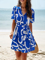 Midi Jurk met V-hals en Bloemenprint - Mini Dresses - Jurkjes.co