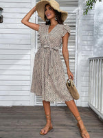 Midi Jurk met V-hals en Dierenprint - Group3 - Jurkjes.co