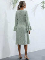 Midi Jurk met V-hals en Polkadot - Group1 - Jurkjes.co