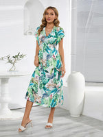 Midi Jurk met V-hals en Tropische Print - Midi Dresses - Jurkjes.co