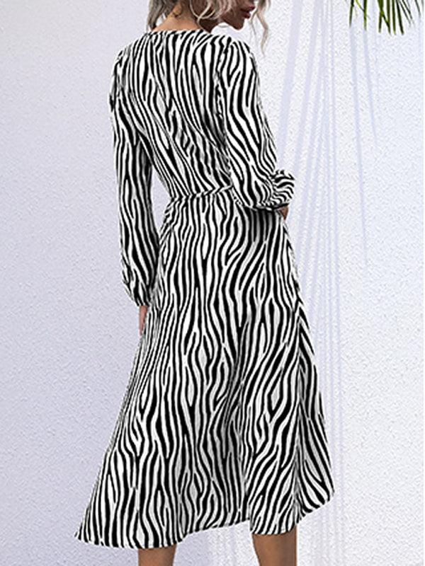 Midi Jurk met V-hals en Zebra Print - Group3 - Jurkjes.co