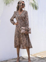 Midi Jurk met V-hals en Zebraprint - Group2 - Jurkjes.co