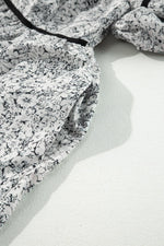 Mini Jurk met Bloemenprint en Ballonmouwen - Floral Dresses - Jurkjes.co