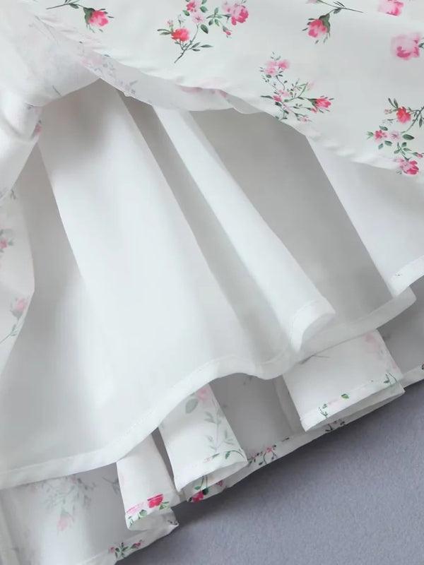 Mini Jurk met Bloemenprint en Gelaagde Rok - Group14 - Jurkjes.co