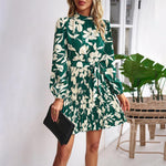 Mini Jurk met Bloemenprint en Plooirok - Group7 - Jurkjes.co