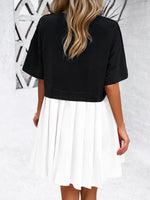 Mini Jurk met Plooirok en Nauwsluitende Taille - Group7 - Jurkjes.co