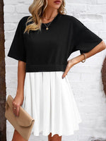 Mini Jurk met Plooirok en Nauwsluitende Taille - Group7 - Jurkjes.co