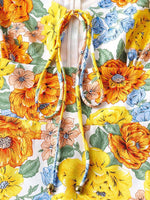 Mini Jurk met V-hals en Bloemenprint - Group14 - Jurkjes.co