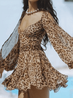 Mini Jurk met V-hals en Doorzichtige Mouwen - Mini Dresses - Jurkjes.co