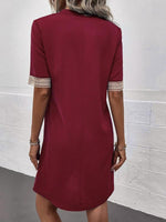 Mini Jurk met V-hals en Kanten Mouwen - Group12 - Jurkjes.co