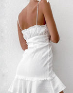 Mini Jurk met V-hals en Knopen - Group7 - Jurkjes.co