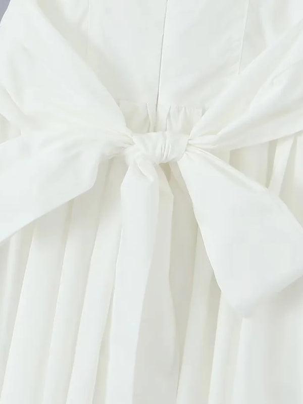 Mini Jurk met V-hals en Plooirok - Group14 - Jurkjes.co