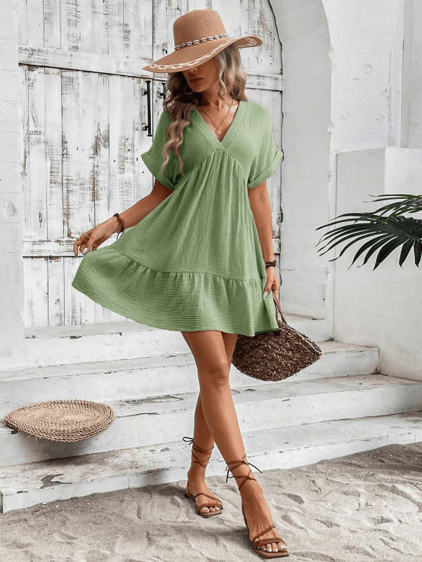 Mini Jurk met V-hals en Plooirok - Group2 - Jurkjes.co