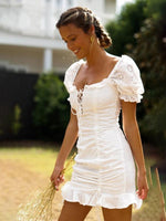 Mini Jurk met V-hals en Puff Mouwen - Group11 - Jurkjes.co