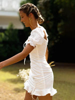 Mini Jurk met V-hals en Puff Mouwen - Group11 - Jurkjes.co